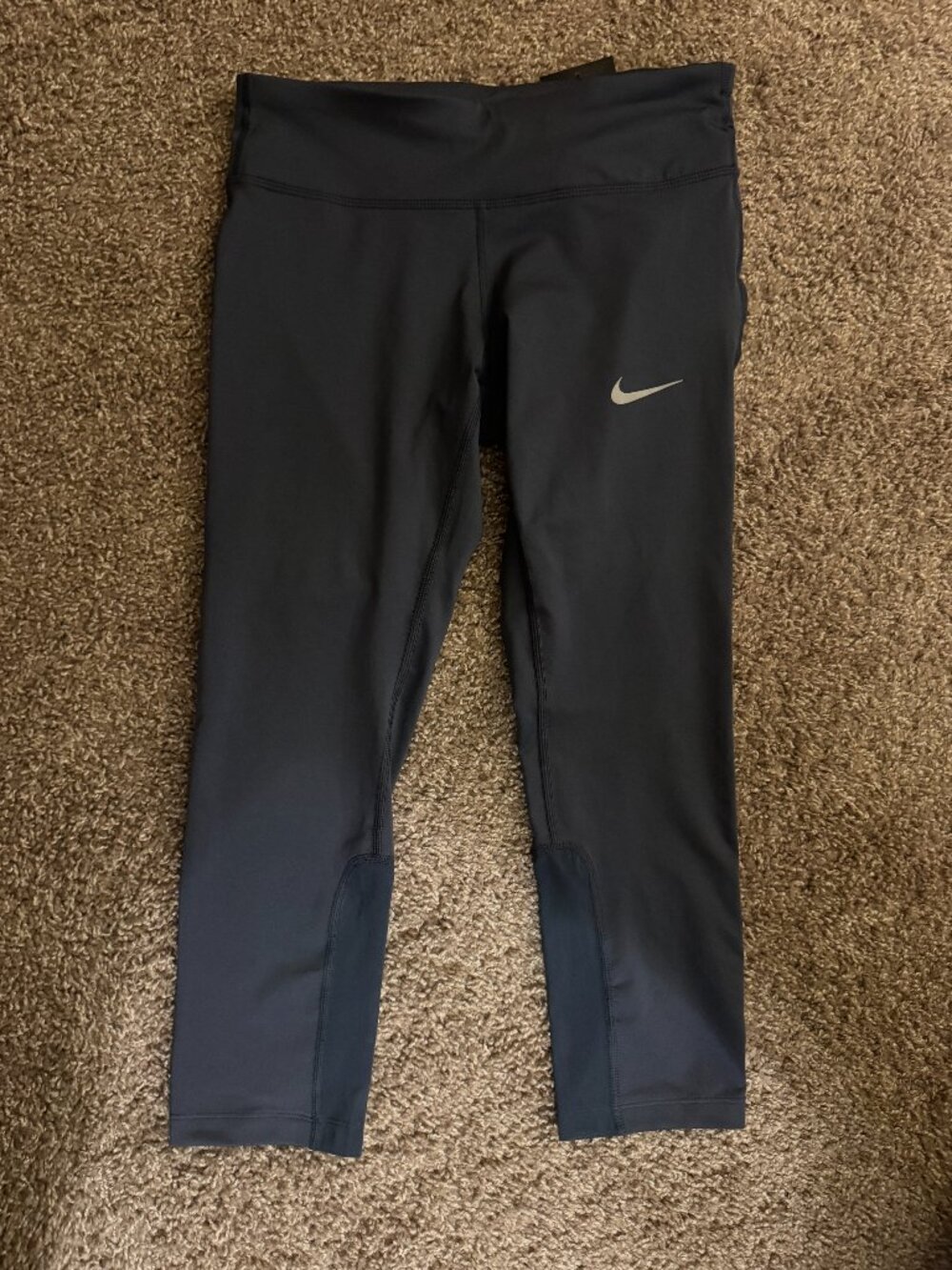 Nike Black Cropped Performance Leggings with Silver Swoosh